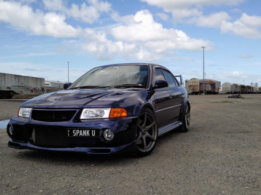 Mitsubishi Lancer Evolution VI wheels OEM Nissan Skyline R34 GTR 18″ 9J ET30 235/40