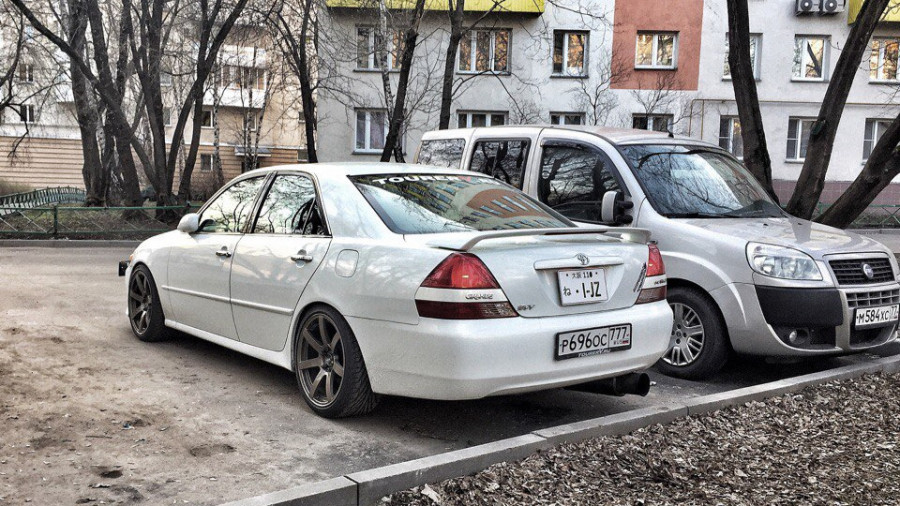 Toyota Mark II 110 Räder Origin DNA-02 R18