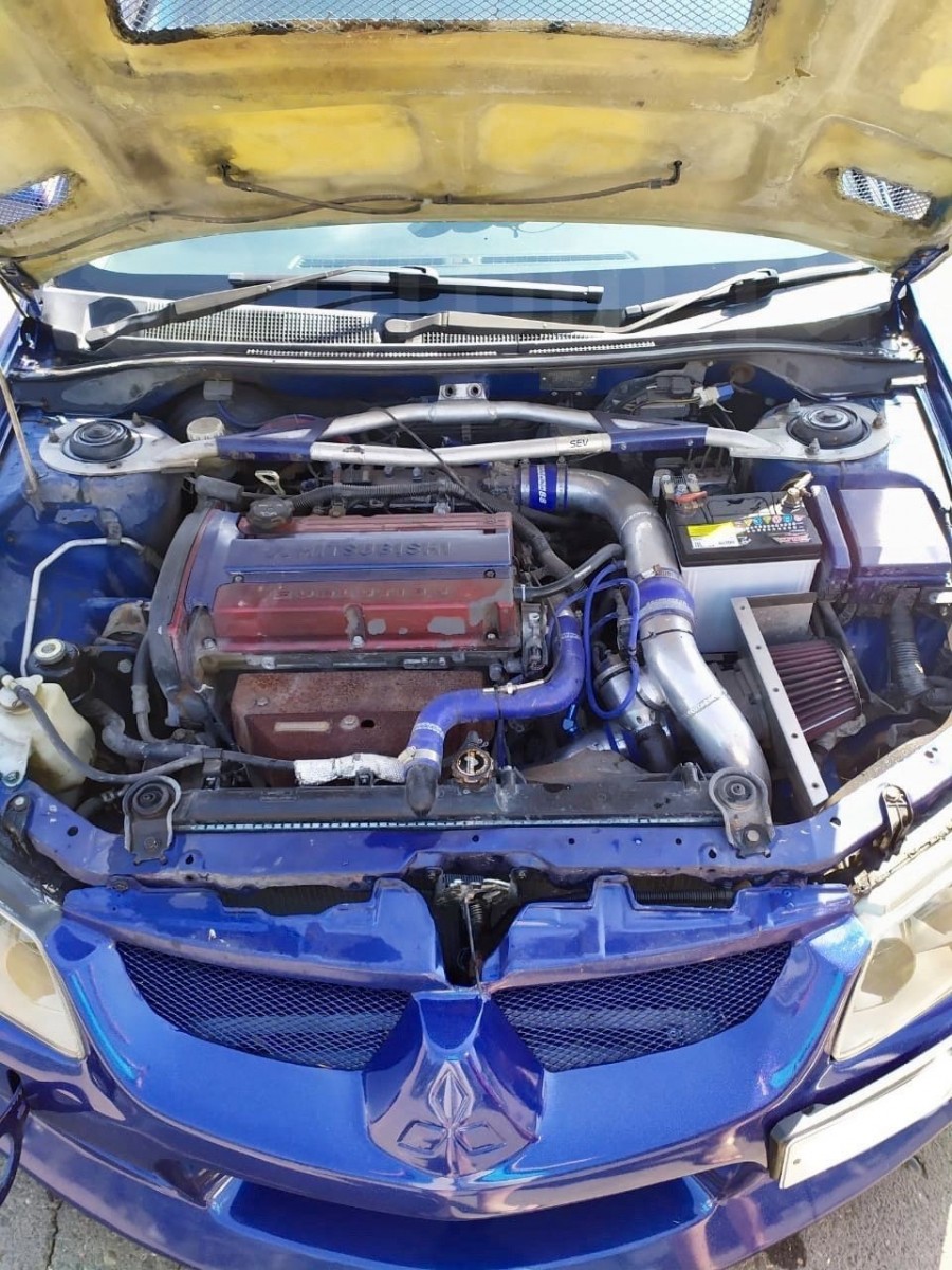 Mitsubishi Lancer Evolution VII rines Piaa Roza Four 18″