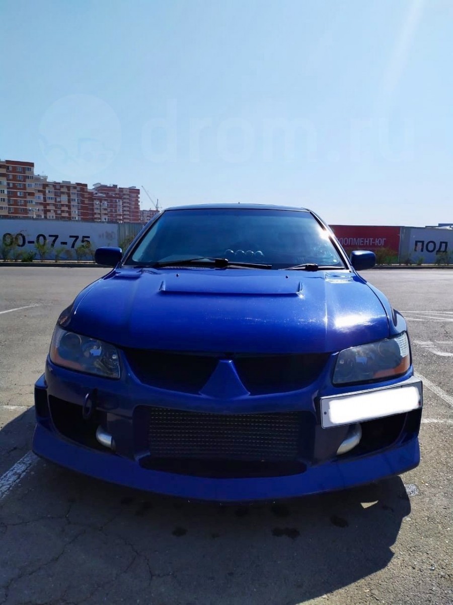 Mitsubishi Lancer Evolution VII roues Piaa Roza Four R18