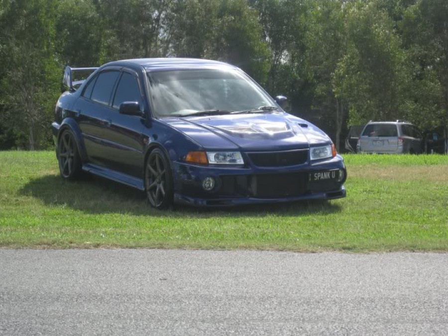 Mitsubishi Lancer Evolution VI roues OEM Nissan Skyline R34 GTR R18 9J ET30 235/40